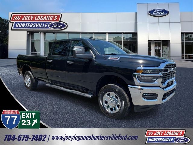 2025 RAM 2500 Tradesman in Diamond Black Crystal Pearlcoat — front three-quarter view