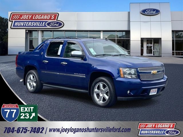 2013 Chevrolet Avalanche 1500 LTZ in Blue Topaz Metallic — front three-quarter view