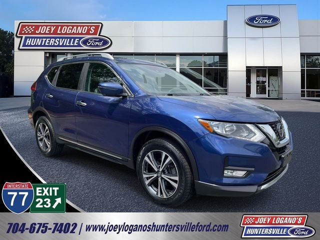 2018 Nissan Rogue SL in Caspian Blue — front three-quarter view